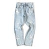Chrome Hearts x Levi's White Cross Patch Jeans